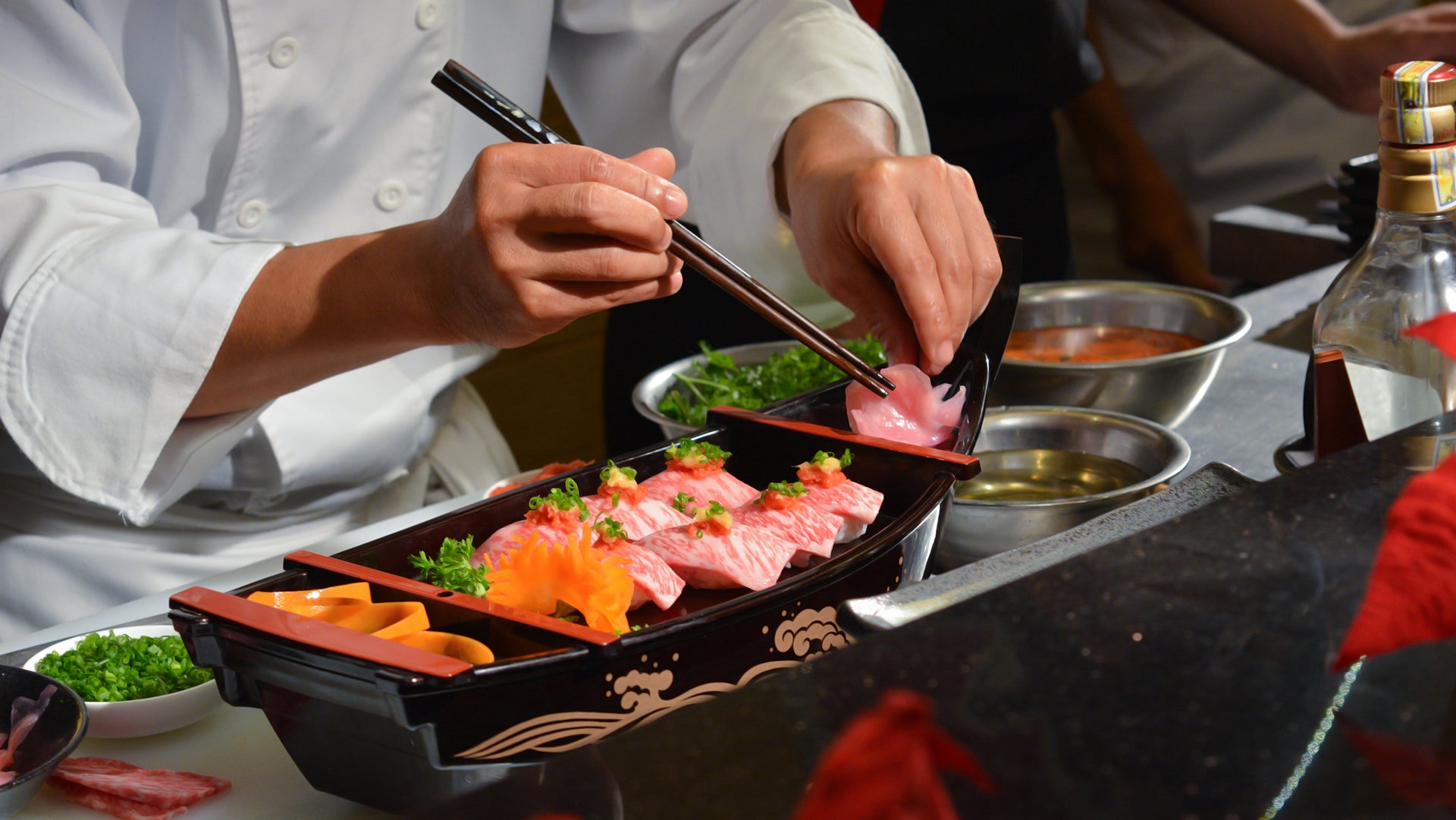 Chief serving  sea food in plate